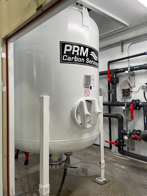 PRM modular water treatment system inside enclosed container with filtration equipment