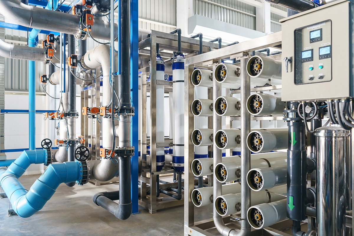 Reverse osmosis membrane housings and treatment piping inside a water treatment facility — state PFAS drinking water regulations require systems sized to meet the most restrictive applicable limit